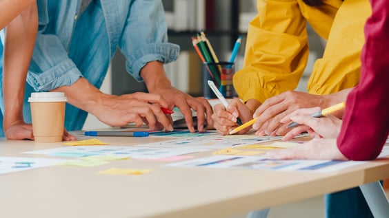 Creative team brainstorming at Door No. 3, a boutique creative agency in Austin