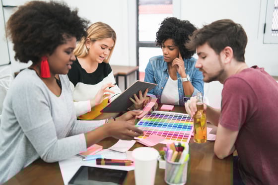 Door No. 3 creative team brainstorming rebranding strategies for client brands