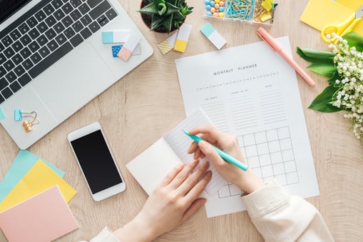 An Image of a planner with busy schedules