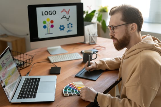 Designer at Door No. 3 creating a visual identity for a healthcare brand
