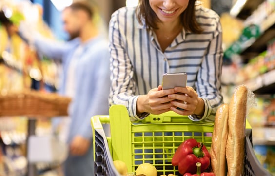 A marketer engaging with consumers on social media for a CPG campaign